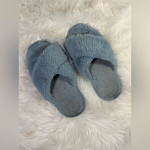 Fluffy well worn blue slippers shoes